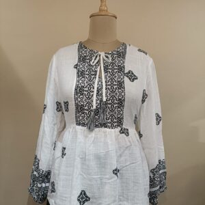 white cotton peplum style top